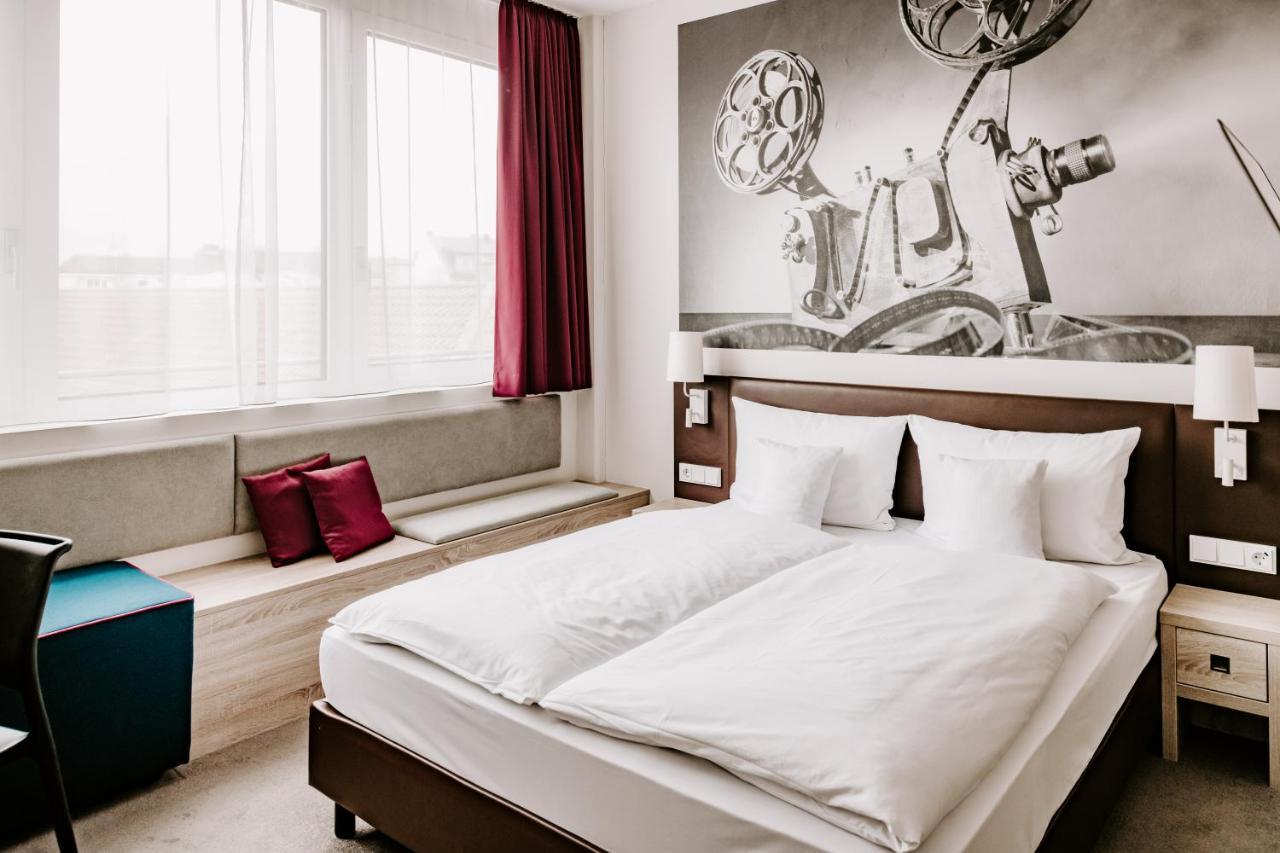 Отель Vienna House Easy By Wyndham Muenchen Экстерьер фото