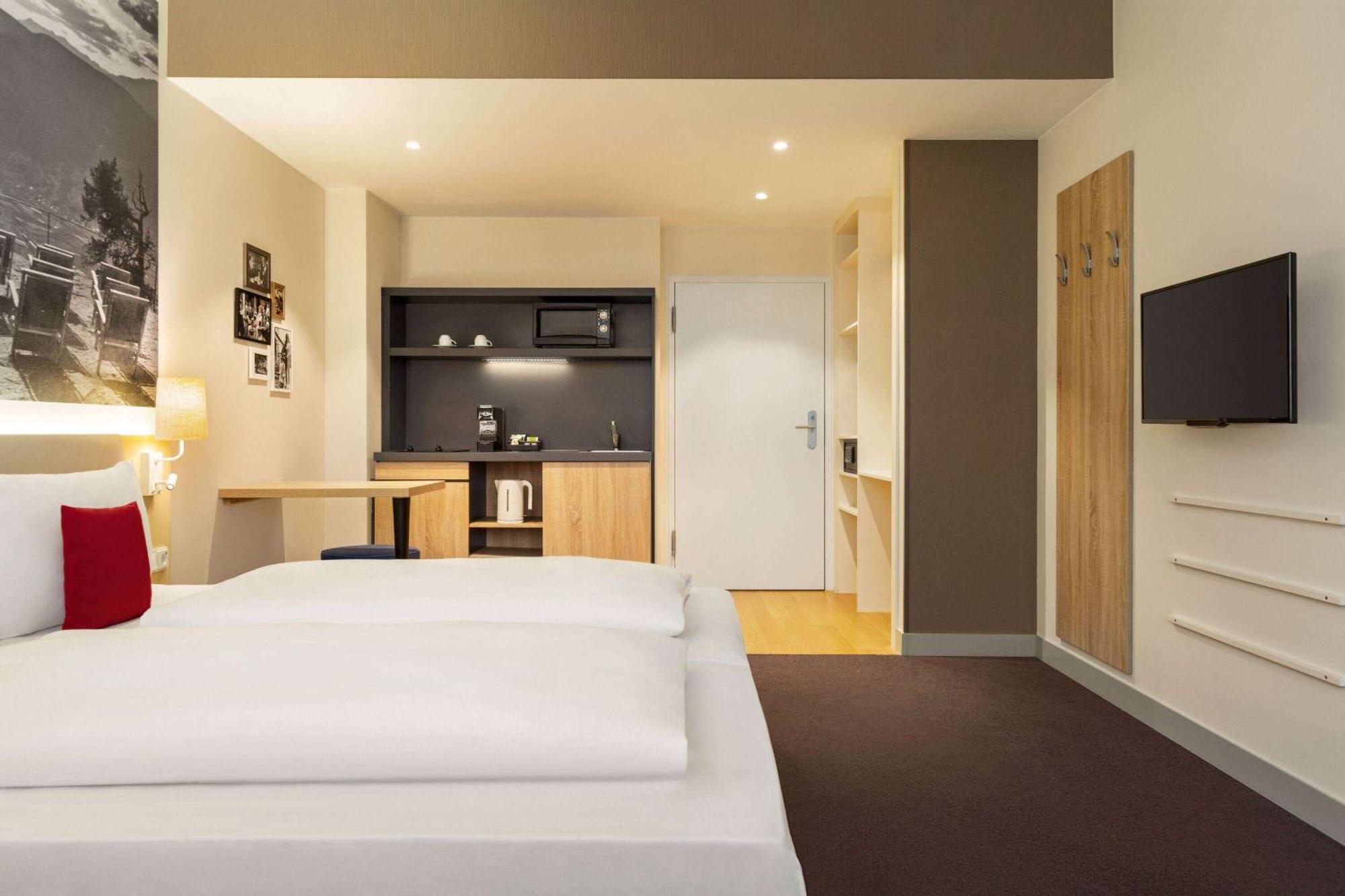 Отель Vienna House Easy By Wyndham Muenchen Экстерьер фото